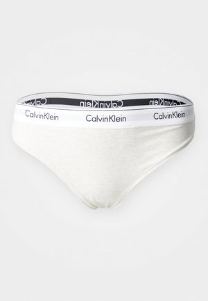 Fehér pamut bikini stílusú alsónemű, fekete-fehér márkázott elasztikus derékkal, rajta a "Calvin Klein" logóval. Puha, sima tapintású.