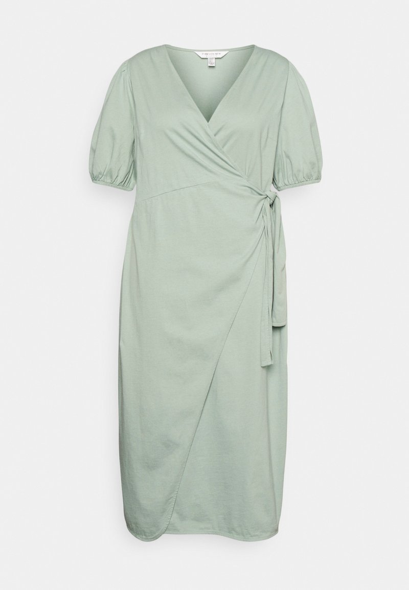 Vestido envolvente verde menta com mangas curtas bufantes, decote em V e um detalhe de laço na cintura. Feito de um tecido leve e suave.