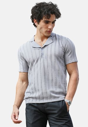 - Koszulka polo