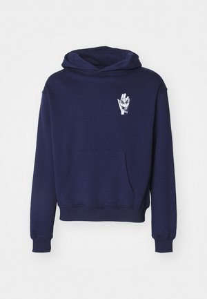 Navy blue hoodie made of cotton blend, featuring a front pocket and a white hand graphic on the chest. Soft texture and relaxed fit.