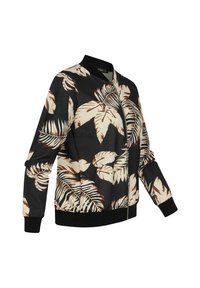 Veste bomber en tissu noir avec de grands motifs de feuilles crème et marron. Dotée d'une fermeture éclair à l'avant et de poignets et d'un ourlet côtelés.