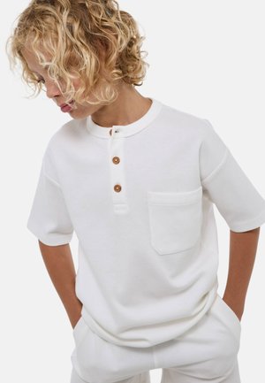 Monoprix, MANCHES COURTES EN NID D'ABEILLE AVEC POCHE POITRINE - T-shirt basique - ecru