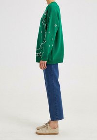 Touché Privé Sweter