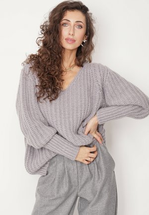 - Sweter