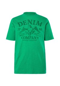 Groen t-shirt met korte mouwen gemaakt van katoen. Voorzien van een grafische afbeelding van een adelaar en de tekst "DENIM COMPANY" in zwart. Rondhals design.