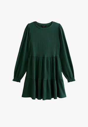 Vestido de punto verde con mangas largas, escote redondo y falda con volantes. Cuenta con tela texturizada y puños elásticos. Diseño sencillo.