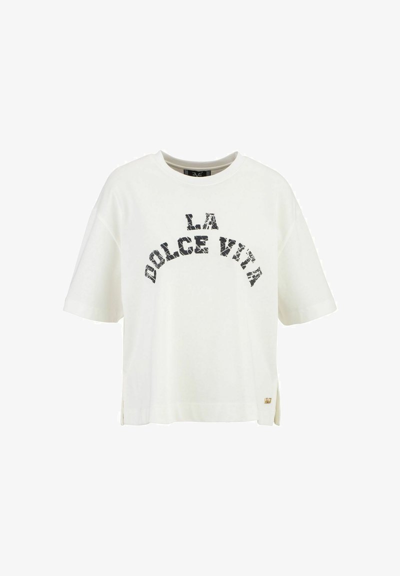 White cotton t-shirt with short sleeves and a loose fit. Features black graphic text “LA DOLCE VITA” and side slits at the hem. Gold accent detail.