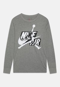 Šedé tričko s dlouhým rukávem vyrobené z bavlny, na přední straně s velkým bílým a černým logem Nike Air a siluetou Jumpman.