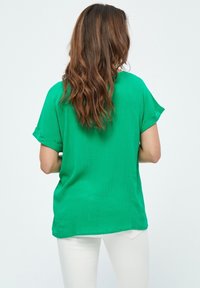 Desires DEAGGI SHORT SLEEVE BLOUSE. - Camicetta - simply green