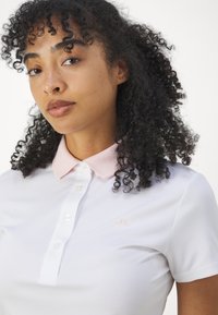 J.LINDEBERG Sports CASSIE  - Polo shirt - dazzle wave rose