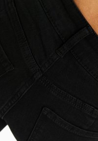 Bershka Vaqueros pitillo - black