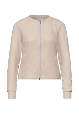 Lichtbeige lange mouwen jas met rits, ronde halslijn en subtiele textuur, met twee zijzakken en geribde manchetten.