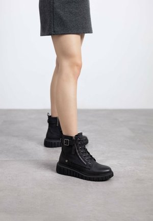 Botines de cuña - black