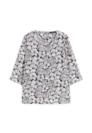 Blusa a maniche lunghe con motivo floreale bianco e nero, scollo rotondo e vestibilità ampia.