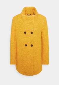 Cappotto giallo doppiopetto con colletto alto, realizzato in tessuto strutturato; presenta due bottoni scuri e maniche lunghe.