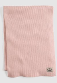 Pink ribbed scarf made from soft material, featuring a textured design and a rectangular shape. Includes a branded patch on one edge.