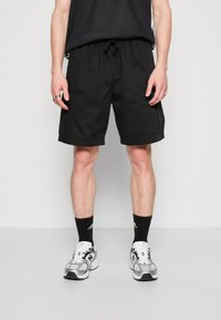 adidas Originals CARGO - Teplákové kalhoty - black