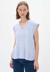 Modrá a biela pruhovaná peplum blúzka s výstrihom do V a krátkymi rukávmi, vyrobená z ľahkého materiálu. Textúra je hladká s voľným strihom.