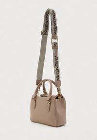 Small beige leather handbag with two short handles and a detachable shoulder strap branded with "VALENTINO" in black letters.