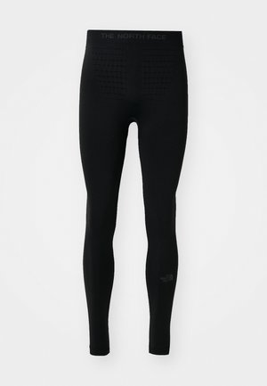 Czarne legginsy z wysokim stanem, z teksturowanym wzorem z tyłu i logo "The North Face" na dolnej części nogawki.