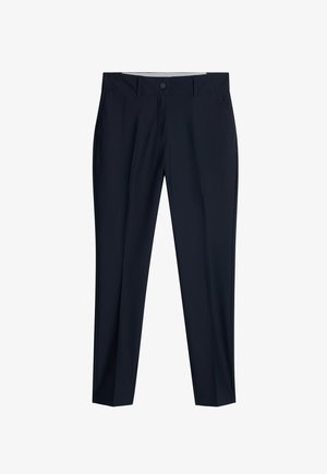 Marineblaue, maßgeschneiderte Hose mit Frontknopf, Gürtelschlaufen, Seitentaschen und subtiler Logoanbringung im rechten Taschenbereich.