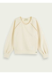 Felpa color crema con scollatura rotonda, maniche a sbuffo e motivi di taglio decorativi lungo le spalle. Dotata di tasche laterali.