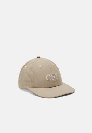 Beige caps laget av bomullstwill, med en buet brem og brodert "OBEY"-logo foran, med sekspanelkonstruksjon og lufteluker.