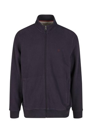 Slim-fit zipsová bunda v tmavomodrom bavlnenom materiáli, s vysokým golierom, dvoma prednými vreckami a malým logom na hrudi.