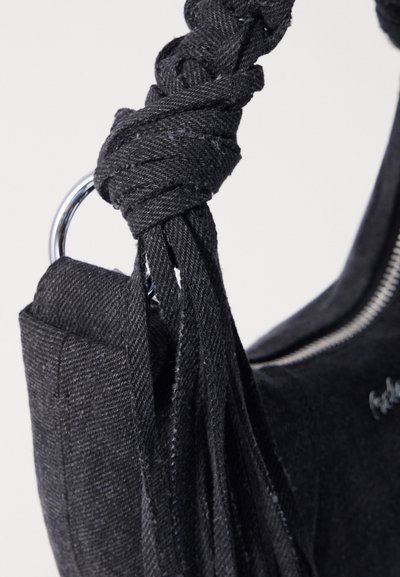 Holzweiler COCOON MICRO BAG UNISEX - Τσάντα χειρός - black washed