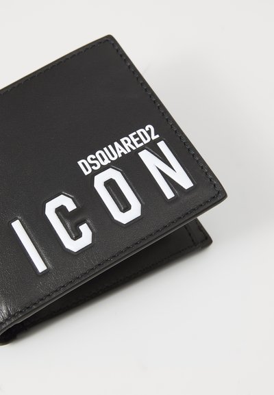 Black leather wallet featuring prominent white "DSQUARED2 ICON" lettering, rectangular shape, smooth texture, and contrasting stitching detail.