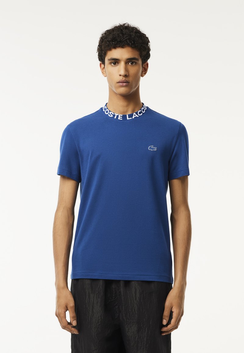 Lacoste CORE ACTIVE - T-shirt imprimé - bleu hbm