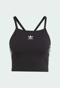 Top corto negro de tirantes, hecho de una tela suave. Presenta finos tirantes entrecruzados y el logo blanco de Adidas con franjas laterales verticales.