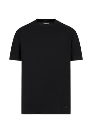 T-shirt nera a maniche corte con tessuto testurizzato, scollatura rotonda e dettaglio logo in basso a sinistra. Forma e design semplici e classici.