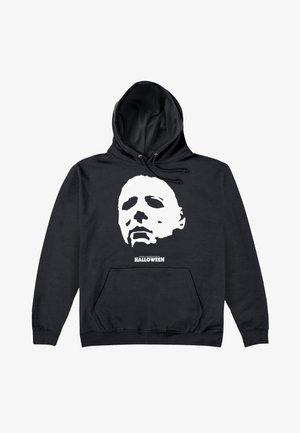 Sweat à capuche noir avec un masque blanc stylisé et le texte "John Carpenter's Halloween" sous le graphique à l'avant.