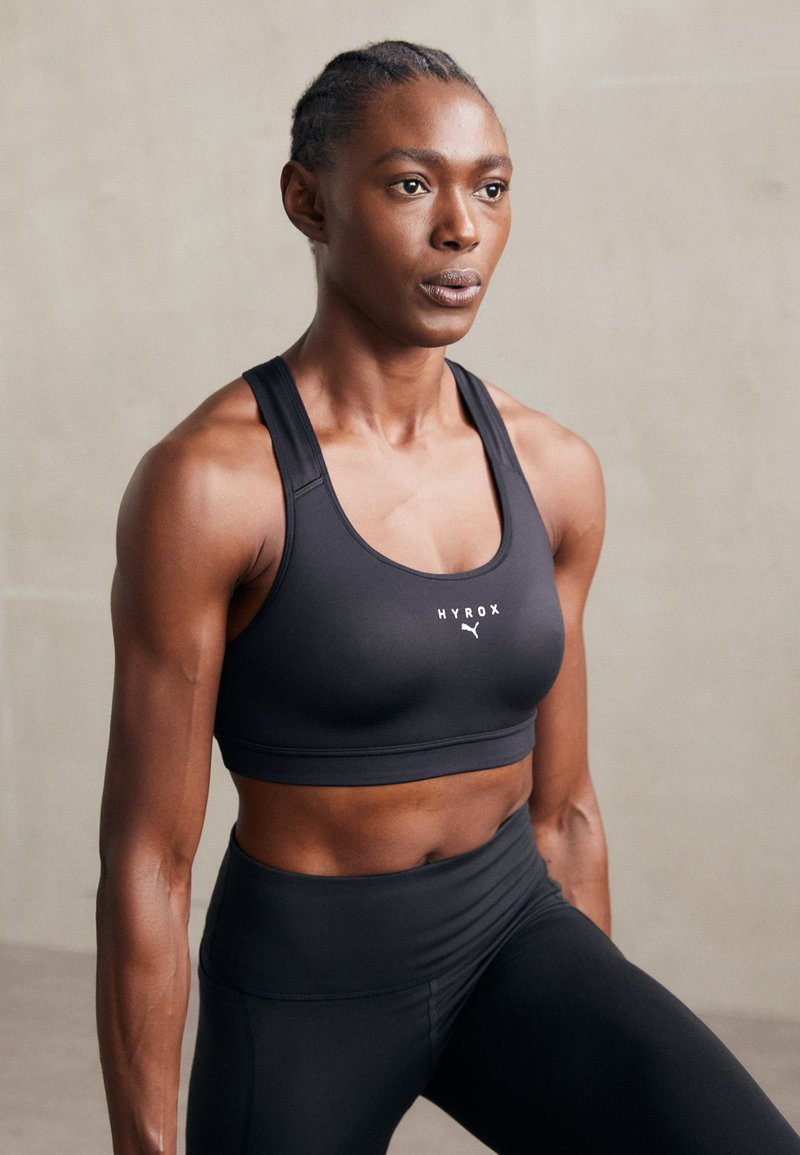 Puma - HYROX MID IMPACT - Medium support sports bra - black, Enlarge