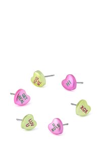 Hjärtfomade pushpinnar i rosa och grönt, med text i kontrasterande färger: "KRAMA MIG," "VARA ÄKTA," "HEJ," "DU REGELERAR," "JAG ÄLSKAR DIG," och "XOX."