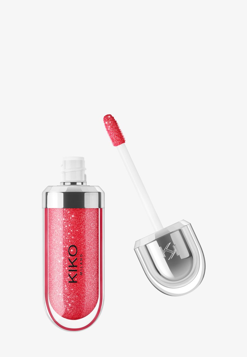 Flacon brillant de gloss à lèvres avec bouchon argenté, gloss rouge scintillant à l’intérieur et applicateur avec embout pailleté rouge.
