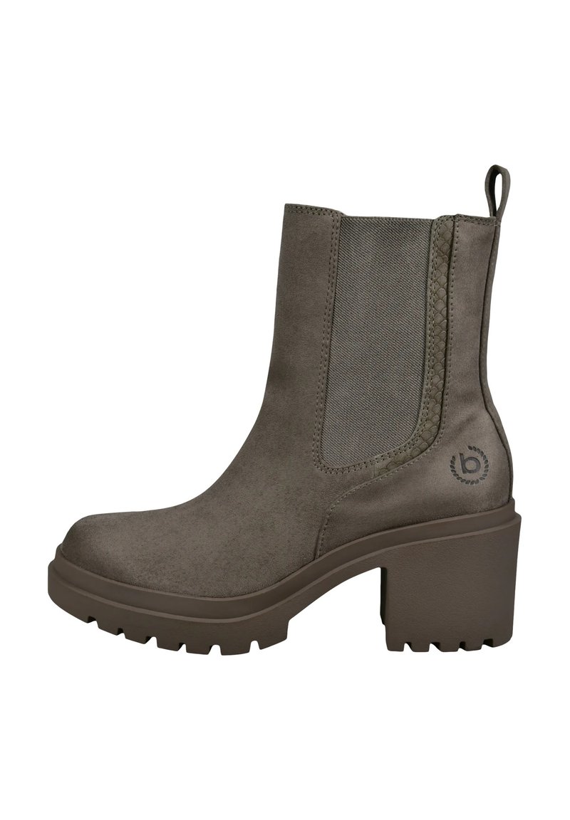 Khakifarbene Stiefeletten aus weichem Wildleder, mit einer dicken, profilierten Sohle und elastischen Seitenteilen sowie einer Schlaufe zum einfachen An- und Ausziehen.