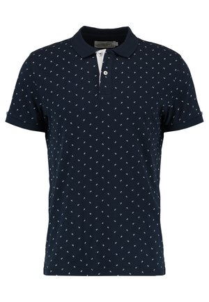 Polo en coton bleu marine, orné d'un petit motif de feuilles blanches, avec une patte de boutonnage à deux boutons et des manches courtes à revers.
