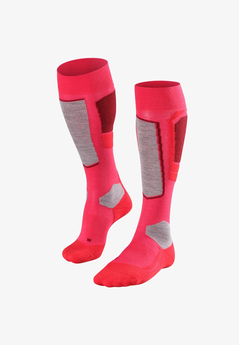 Calze al ginocchio di un brillante rosa con accenti grigi, caratterizzate da un motivo testurizzato e sezioni rinforzate per comfort e durata.