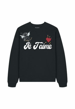 Sweatshirt noir avec col rond ; présente le texte blanc "Je T'aime", un ange illustré et un cœur rouge avec des accents jaunes. Tissu doux.