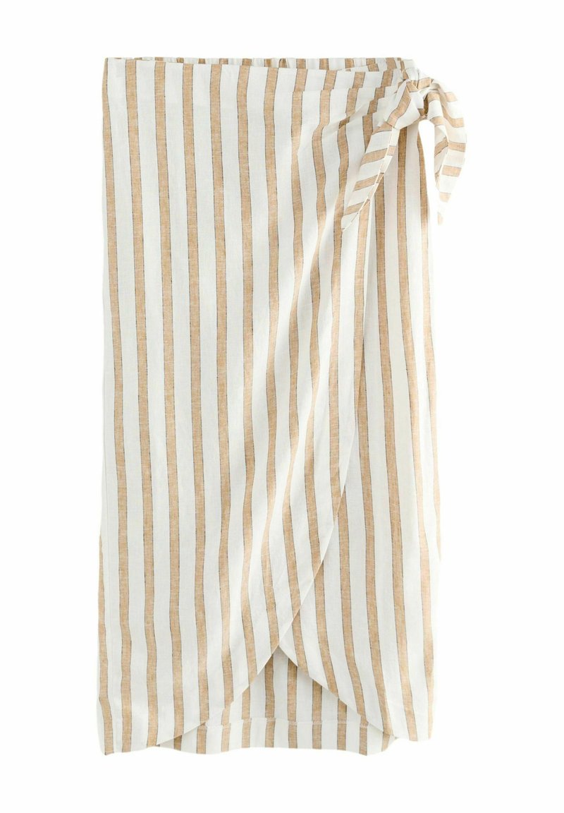 Linneförpackning med vertikala beige och vita ränder, knuten i midjan, som visar en mjuk textur och lätt design.