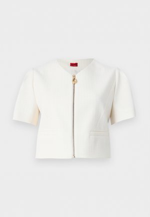 Λευκό κοντομάνικο μπουφάν με υφή υφάσματος, μπροστινό φερμουάρ με χρυσό κρίκο και δύο μπροστινές τσέπες με ρέλια.