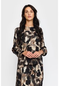 Blus med långa ärmar i ett flytande tyg med ett abstrakt blommönster i svarta, beige och bruna toner; elastiska manschetter; lös passform.