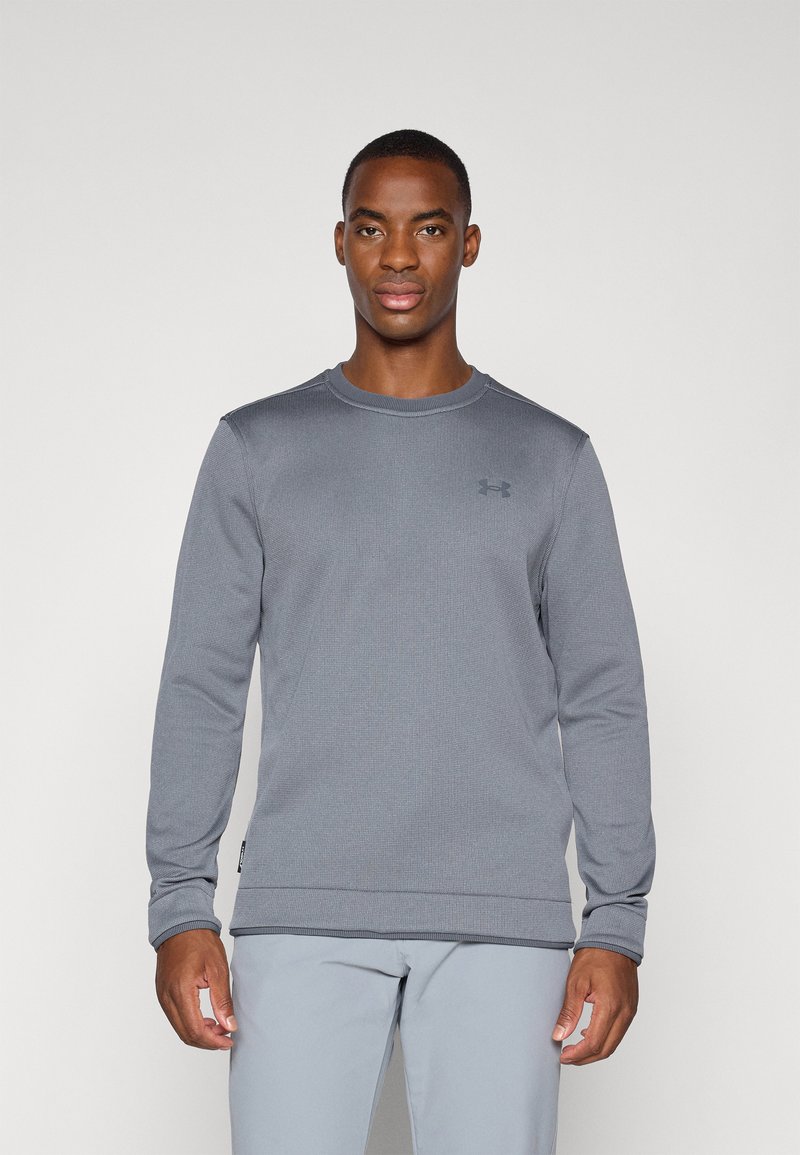 Gray long-sleeve sweatshirt with a textured fabric and round neckline. Features subtle branding on the chest and ribbed cuffs.