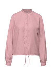 Blusa a maniche lunghe in morbido tessuto rosa pallido con colletto arricciato, chiusura frontale con bottoni e un fiocco in vita. Tessuto liscio e vestibilità comoda.