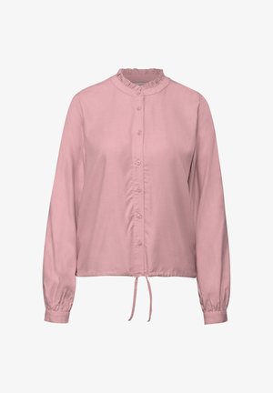 Halenka s dlouhým rukávem v měkké růžové látce s volánkovým límcem, předním zapínáním na knoflíky a zavázáním v pase. Hladká textura a volný střih.