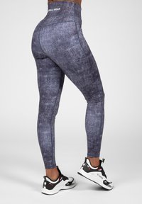 Hoge taille leggings in een gemêleerd donkergrijs stof, met een aansluitend ontwerp, platte naden en een elastische tailleband met logo.