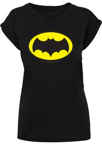 Black t-shirt with rolled short sleeves featuring a large yellow Batman logo in the center. Made of soft cotton material.