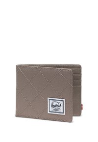 Prošívaná šedá látková peněženka s bílou nálepkou Herschel. Obsahuje více slotů na karty a minimalistický design. Ozdobeno červenými pruhy.